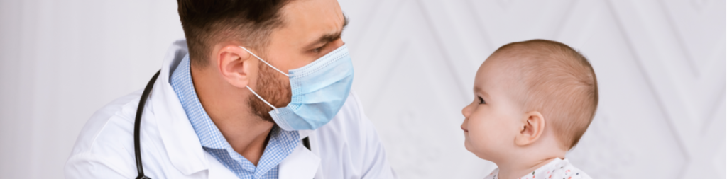 Doctor examines baby